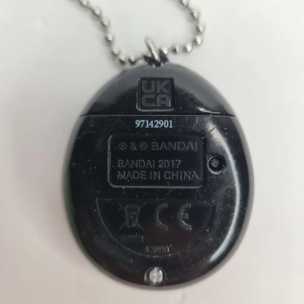 Tamagotchi Electronic Game Bandai‎ 2017 Black Purple Silver Flame Keychain